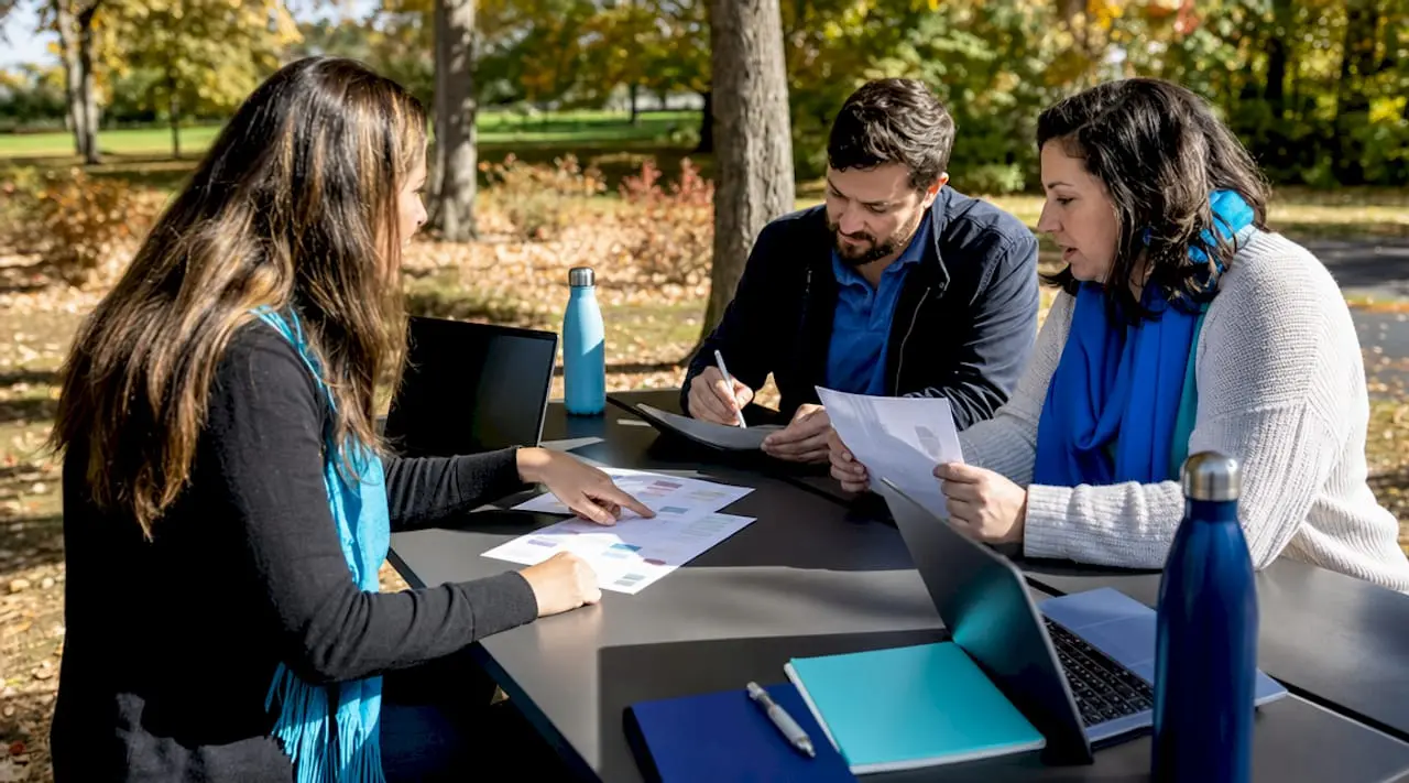 Nonprofit team discussing email platform options
