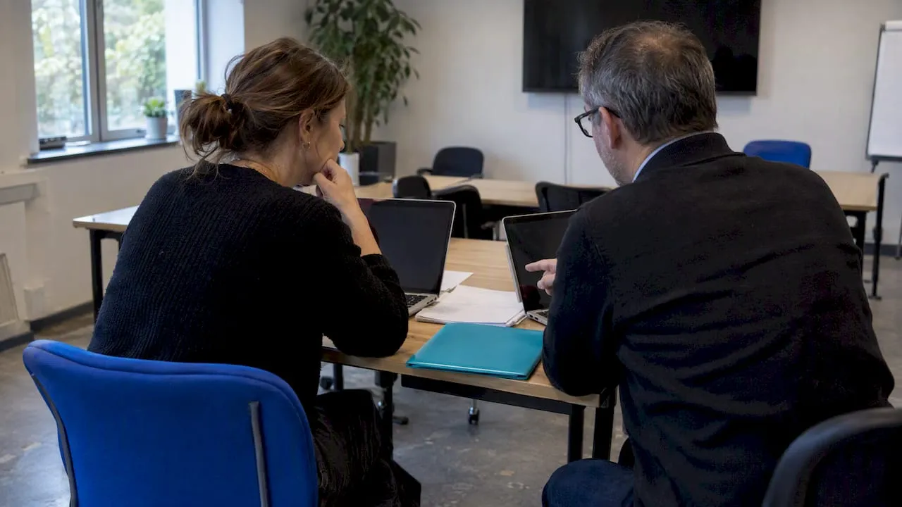Association staff comparing engagement software options